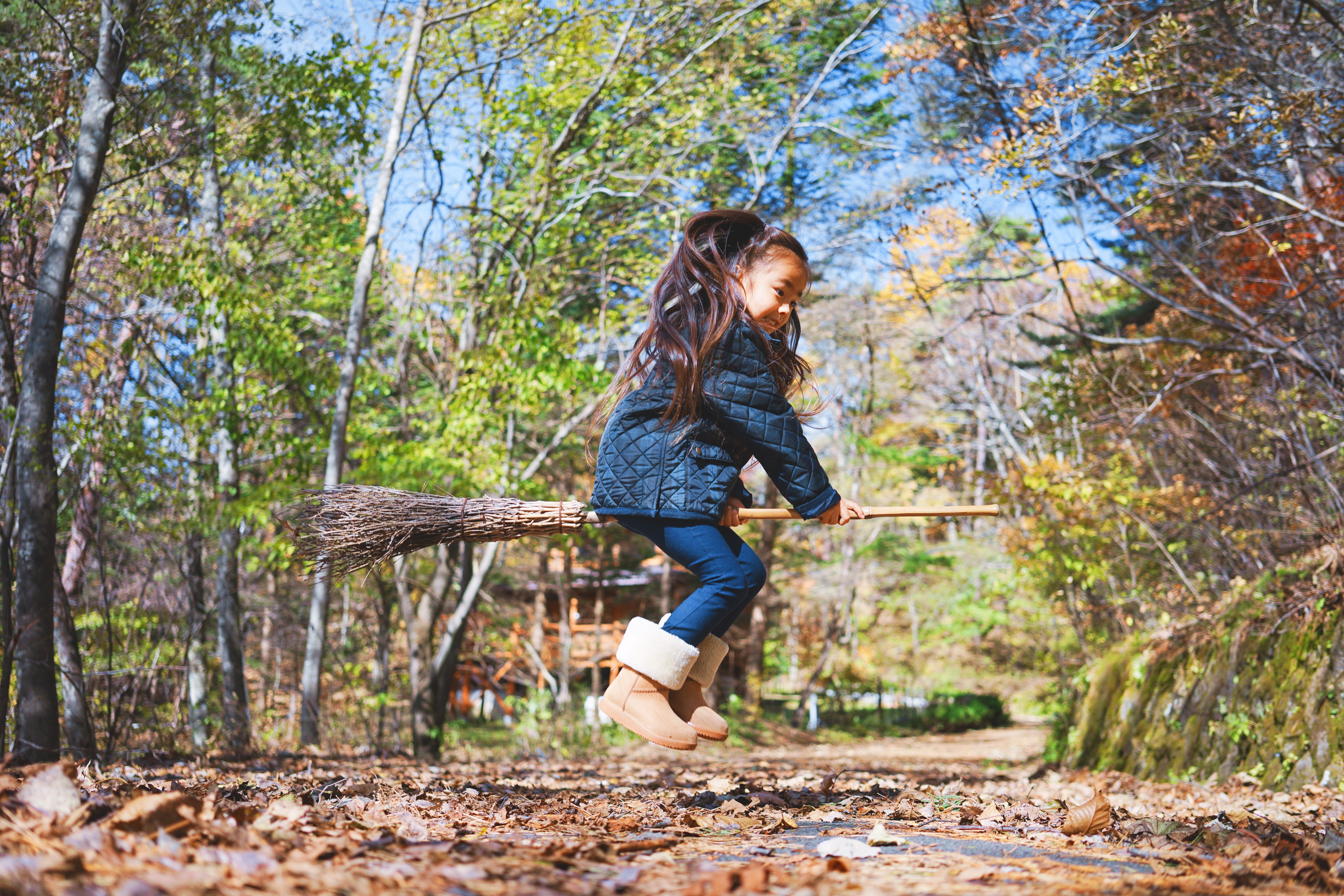 Girl flying on broom