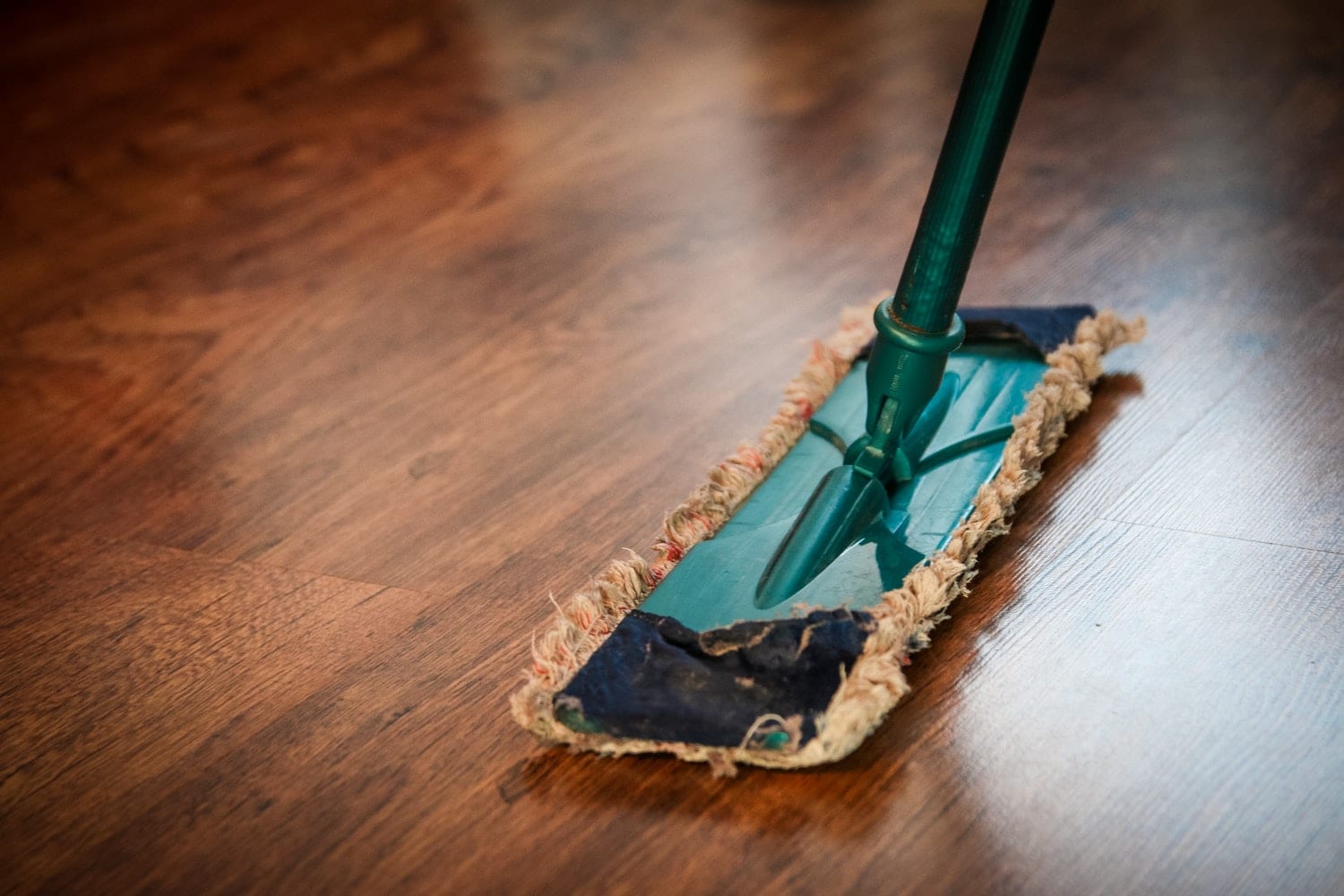 Mop on wooden floor