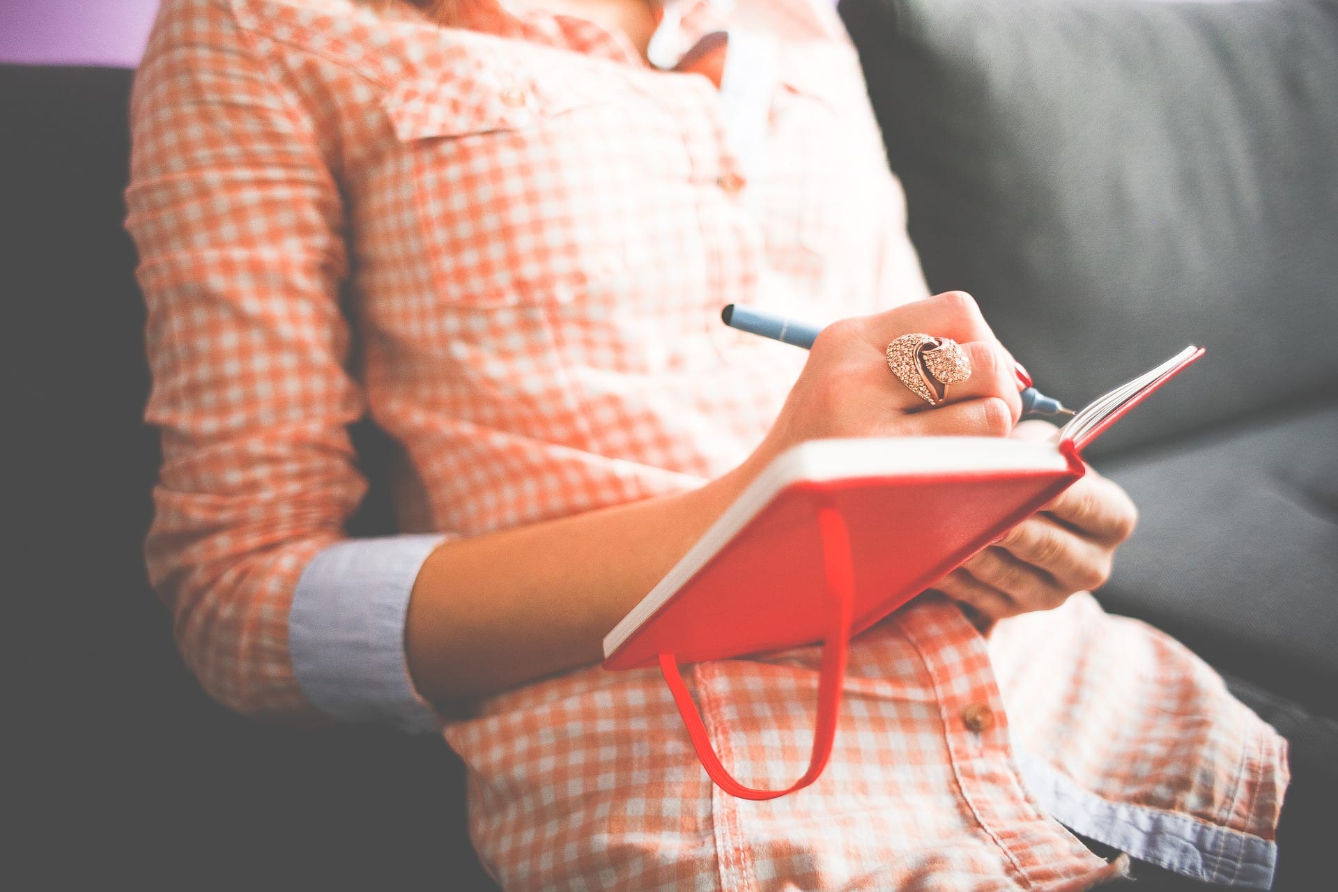 Woman writing in journal